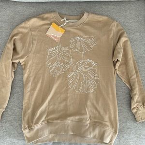 Women’s post surf sweatshirt. Tan size small NWT